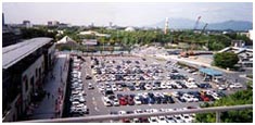 2002年春 クレオ5階エレベーターホールより、キュート建設予定地(中央3駐車場)を見下ろしたところ。
